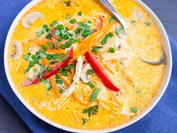 This Coconut Curry Chicken Soup with Quinoa is easy to make, healthy and ready in under 30 minutes. King of the thai comfort foods, this delicious red curry soup is full of veggies, gluten-free, and can be made paleo, vegan and low-carb with a few simple ingredient swaps. 