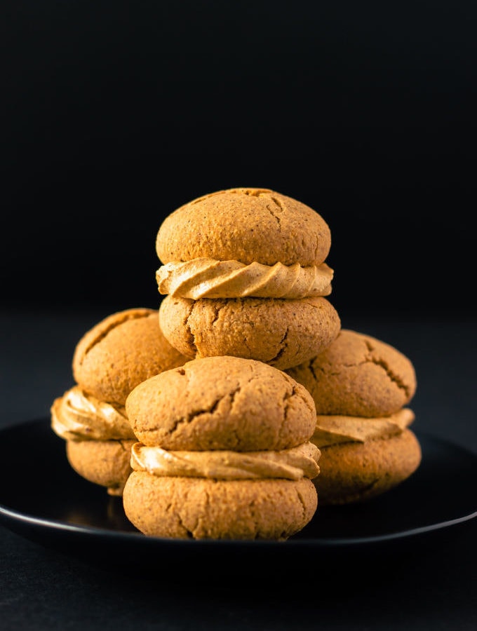 Apple Pie Flavored Vegan Protein Cookies with a salted caramel filling! Healthy, simple and naturally sweetened. Vegan, gluten-free, dairy-free and egg-free recipe. | onecleverchef.com
