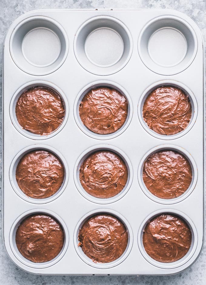 Brownie batter in a muffin pan