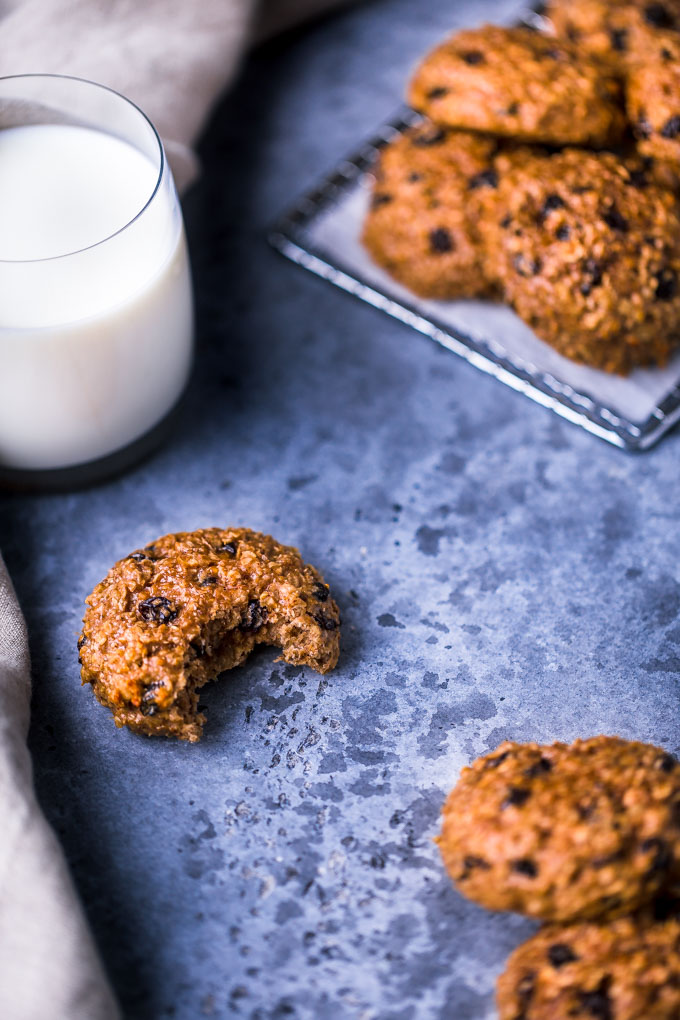 Oatmeal raisin protein cookies with a glass of milk