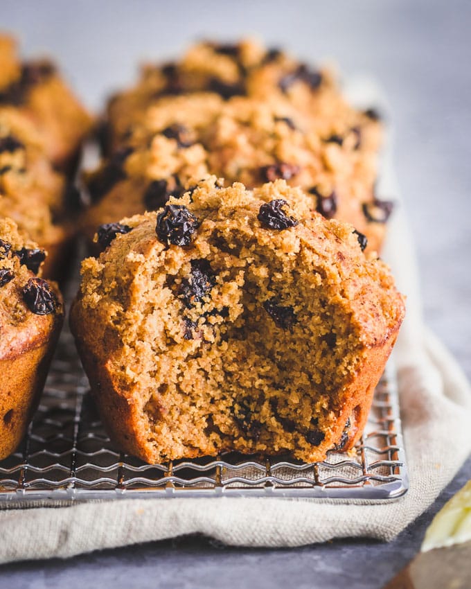Oatmeal raisin protein muffins on a cooling rack
