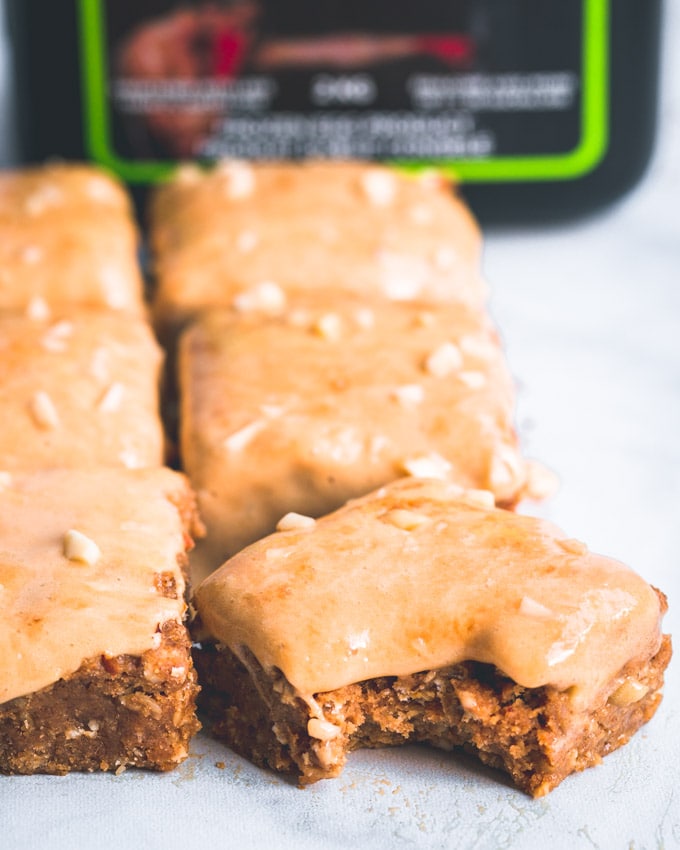 Caramel oatmeal protein bars with a bite taken