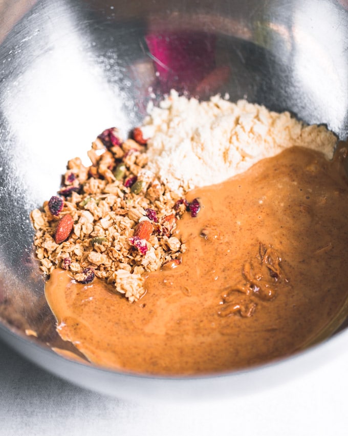 Cranberry Almond Granola Protein Ball ingredients in a mixing bowl
