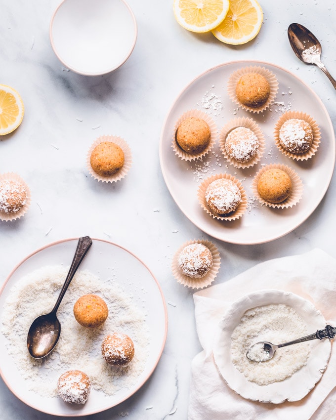 Lemon coconut protein balls on a plate